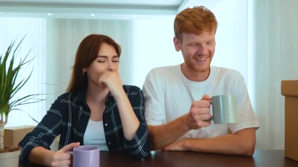 Close Joyful Handsome Boyfriend Beautiful Girlfriend Drinking Coffee New Apartment — 비디오