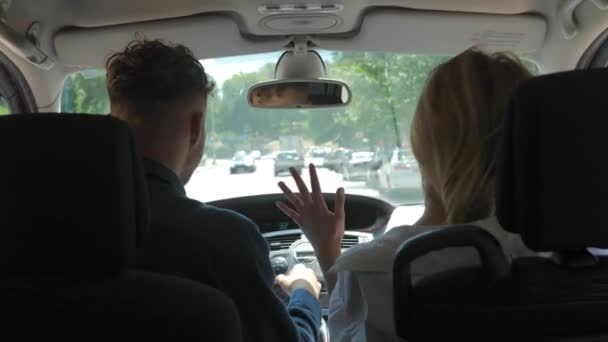Rear Happy Young Couple Man Woman Sitting Car Having Trip — Stockvideo