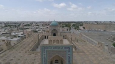 Historical Mir-i Arab, Po-i Kalyan Madrasa and Complex. Historical City of Bukhara in Uzbekistan. Log Shooting. Color Editable.