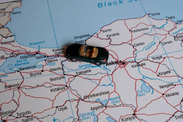 Toy car on Turkey map, miniature green sport car on Turkey travel concept, map idea, country tour
