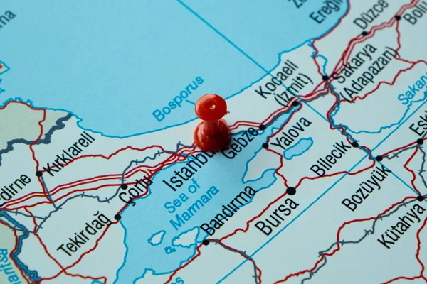 Istanbul location on map with red thumbtack, travel idea, Turkey and Istanbul on map with red fastener, vacation and road trip concept, top view