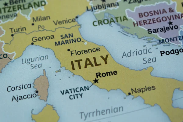 Italy location on map , Europe travel idea, Rome and Italy on map with a red fastener, vacation and road trip concept, pinned destination, top view