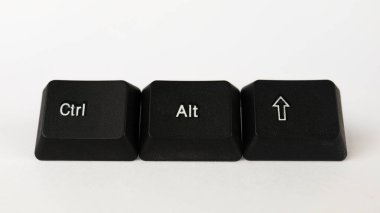 Ctrl alt silme kısayolu metni beyaz bckground, bilgisayar terminolojisi, beyaz Ctrl alt silme harfleri siyah klavyede, üst görünümde izole edilmiş klavye tuşları ile oluşturuldu