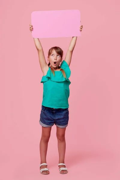 Cute Laughing Child Girl Holding Signboard Empty Space Text Advertising — Foto Stock
