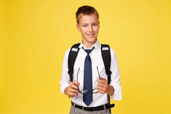 Portrait Schoolboy Glasses Textbooks Backpack Yellow Background Back School — Zdjęcie stockowe