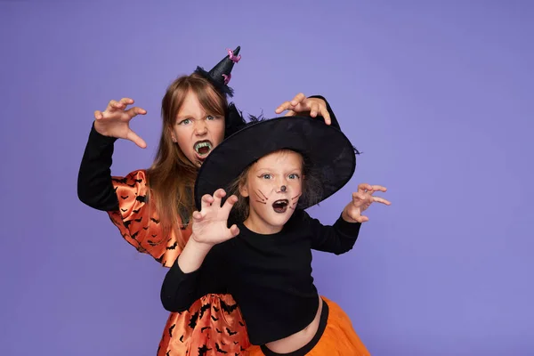 Funny Children Carnival Costumes Skeleton Witch Honor Halloween Purple Background —  Fotos de Stock