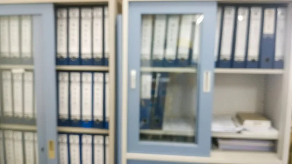 Racks with archival documents, storage of documents.hite office shelves with different stationery, close up