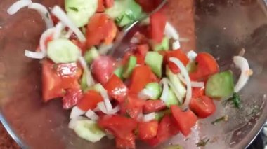 Girl is preparing a salad