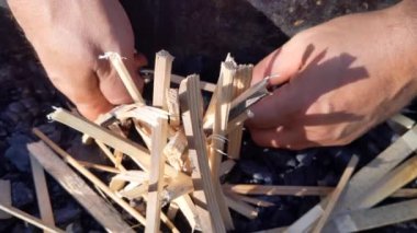 Lighting a fire in nature