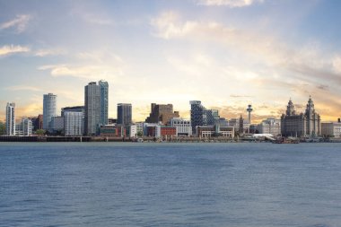 A beautiful landscape shot of the Liverpool City skyline. present are the Liver Birds, City Tower, Ferry Terminal and other famous buildings. This is a wonderful image of this cityscape of this famous city.