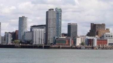 A beautiful landscape shot of the Liverpool City skyline. present are the Liver Birds, City Tower, Ferry Terminal and other famous buildings.