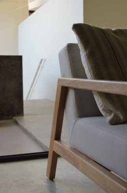 armchair, chair, individual sofa, solid natural wood structure, seat and back in fabric, very comfortable chair to relax and enjoy the day. nature and apparent materials are observed.