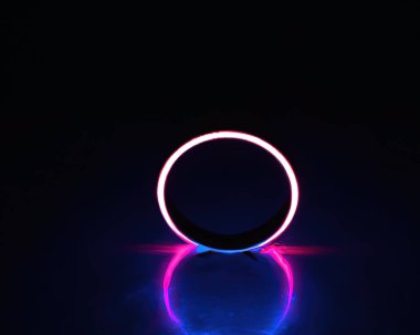 light rings, pink and blue, magenta and turquoise with reflections on the floor, black background, moving light rings, background, wallpaper, wallpaper, mobile background