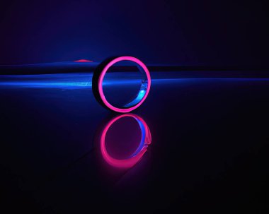 light rings, pink and blue, magenta and turquoise with reflections on the floor, black background, moving light rings, background, wallpaper, wallpaper, mobile background
