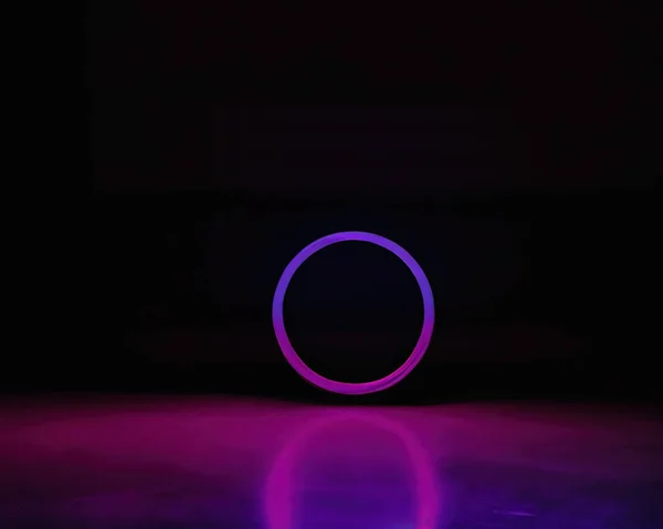 stock image light rings, pink and blue, magenta and turquoise with reflections on the floor, black background, moving light rings, background, wallpaper, wallpaper, mobile background