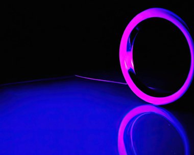 light rings, pink and blue, magenta and turquoise with reflections on the floor, black background, moving light rings, background, wallpaper, wallpaper, mobile background