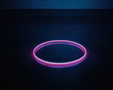 light rings, pink and blue, magenta and turquoise with reflections on the floor, black background, moving light rings, background, wallpaper, wallpaper, mobile background
