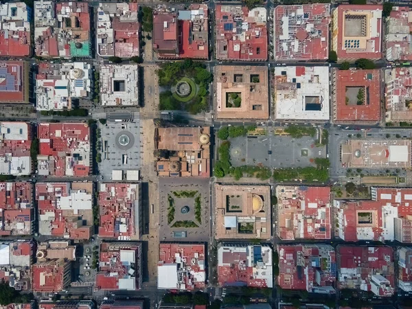 view from the sky, view from above the cross of squares in guadalajara, mexico, latin america, public squares forming a cross in plan