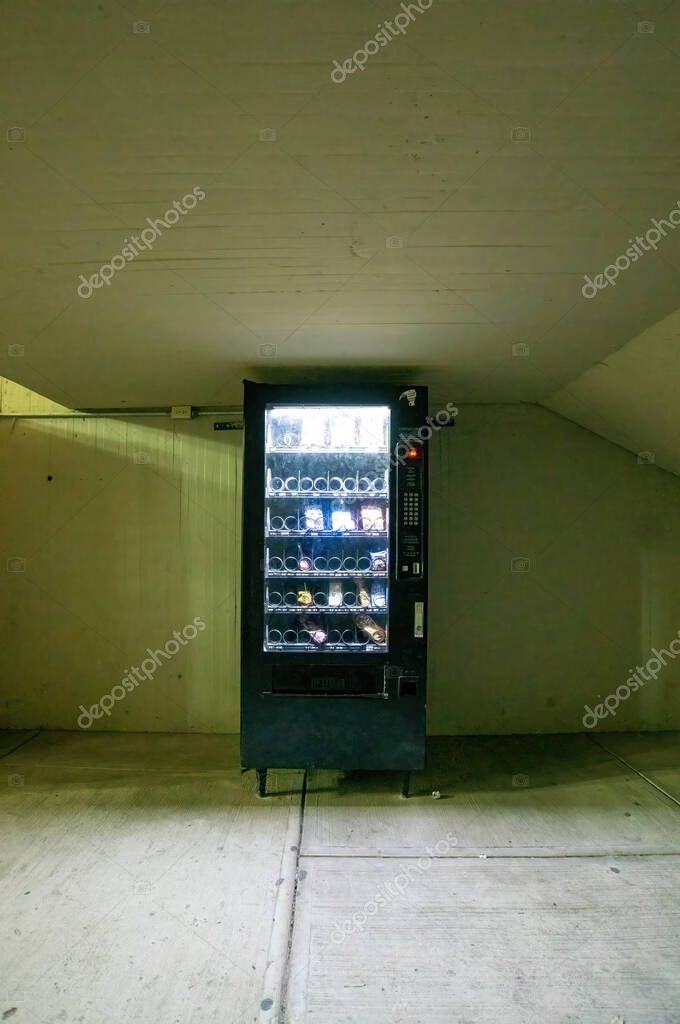 Vending machine, with interior light, wall, ceiling and concrete floor, mexico latin america