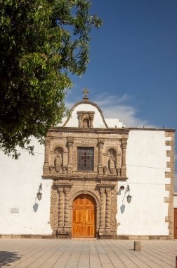 chapel Old building, village church, colonial architecture walls, aged wooden door, with steel rivets,