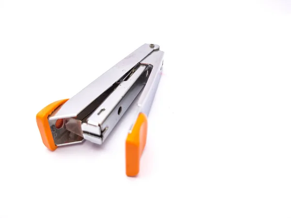 Yellow handy stapler isolated on white background