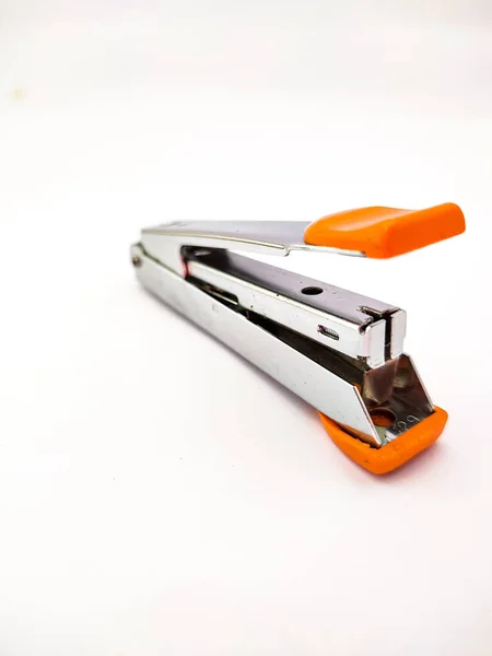 Yellow handy stapler isolated on white background
