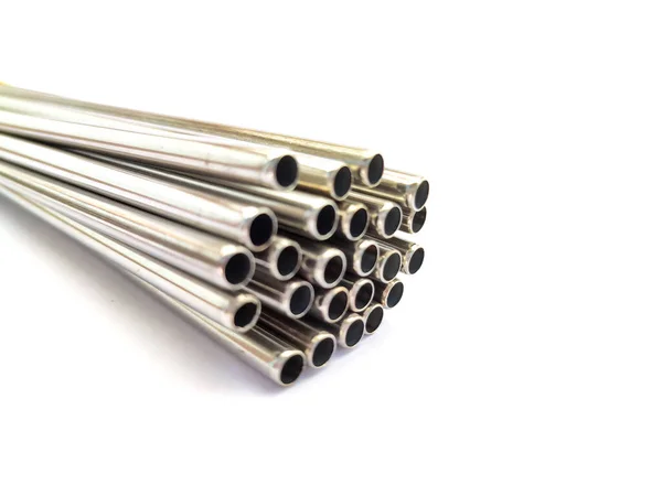 Steel or Aluminum straw pipes of small diameters isolated on white background.