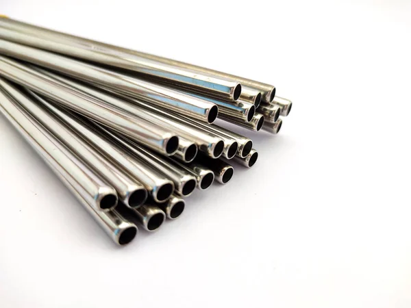 Steel or Aluminum straw pipes of small diameters isolated on white background.
