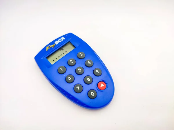 Mojokerto, Indonesia - May 5th, 2022. Close up photo of Key BCA, internet banking token used for online transactions, especially for BCA banks in Indonesia. Bank Central Asia
