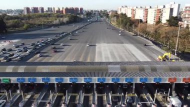Riccheri highway towards capital from a drone, toll Buenos Aires - moving away