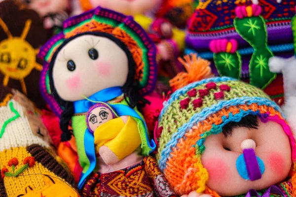 Ethnic multicolored handmade rag dolls at the fair of San Telmo Buenos Aires