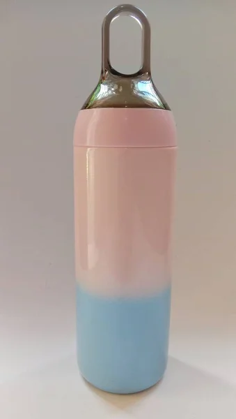 Light Pink Blue Colored Drinking Bottle Isolated White Background — Stock Photo, Image