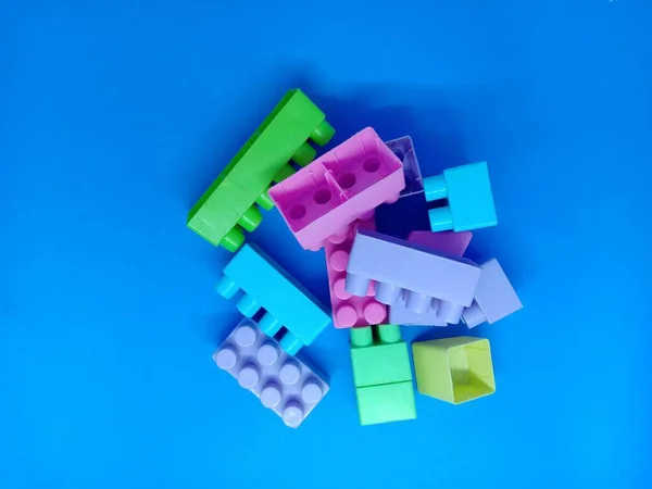 Colorful Plastic Blocks Isolated Blue Background Children Educative Toy — Stock Photo, Image
