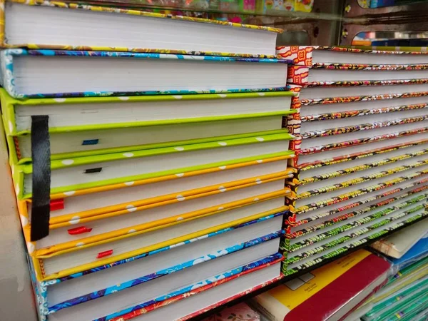 Stack of books on the shelf of the book store