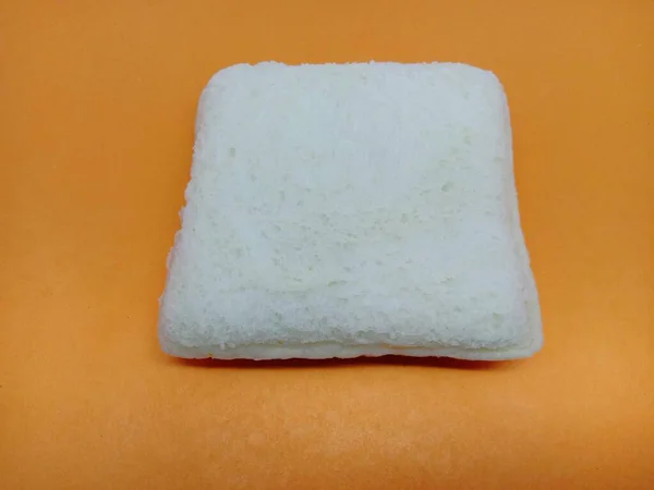 Piece Soft White Bread Isolated Orange Background — Φωτογραφία Αρχείου