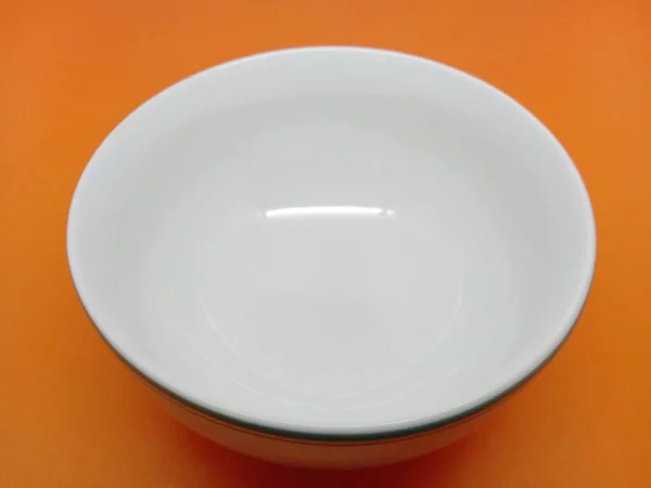 Empty White Ceramic Bowl Isolated Orange Close — Stock Photo, Image