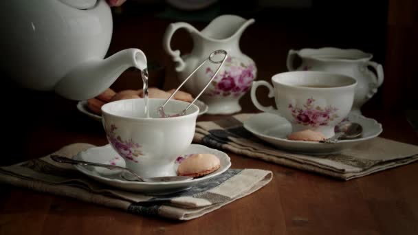 Pouring Tea White Ceramic Cup Tea Pot Ceremony Family Event — Stock Video