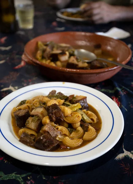 Portuguese Farmer Pasta with Pork Meat and Green Cabbage, an Homemade Traditional Dish made for the Workers on a Vineyard Farm, Povoa de Lanhoso, Minho, Portugal.