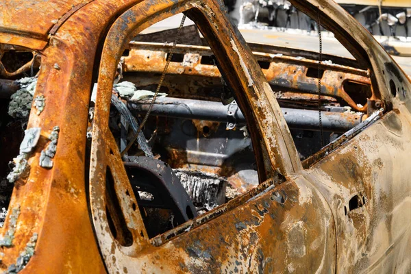 Burnt out car crash after fire. Close-up