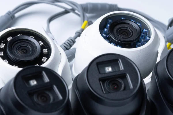 Modern White Black Security Cameras Close Video Surveillance Concept Background — Stockfoto