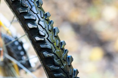 Aggressive bicycle off-road rubber tread close-up