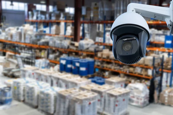 CCTV system security in warehouse of factory chemical blur background.
