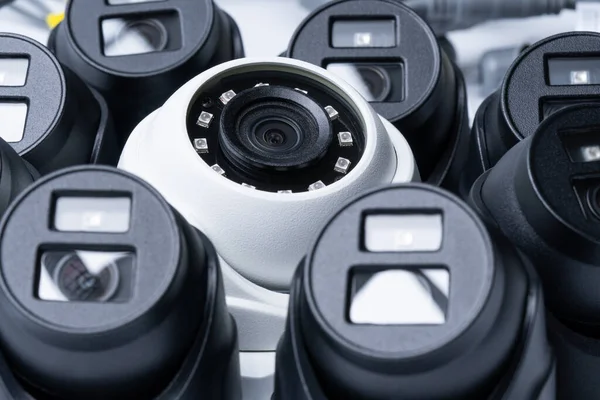 Close White Security Camera Surrounded Black Cameras — Stockfoto