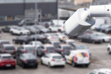 Video surveillance camera installed on a vehicle parking