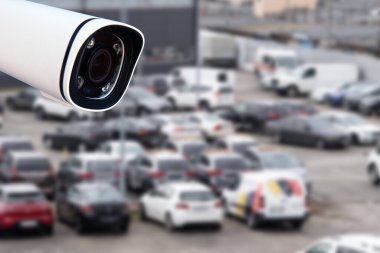 Video surveillance camera installed on a vehicle parking
