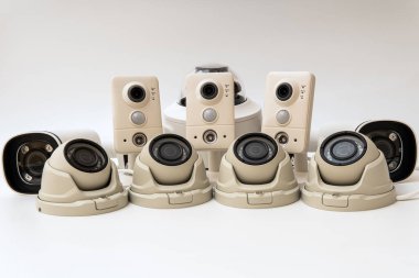 Set of modern public CCTV camera isolated on white background. Intelligent recording cameras for monitoring all day and night. Concept of surveillance and monitoring.