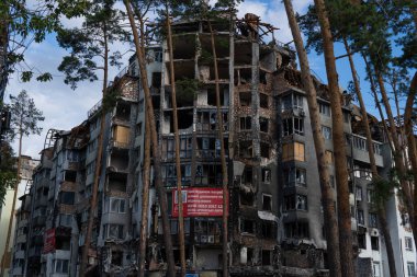 The ruins of multi-storey buildings after the shelling. Burnt houses due to explosions. The house was damaged by bombs and aircraft. War between Russia and Ukraine, Irpin-Bucha, April 10, 2022