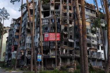 The ruins of multi-storey buildings after the shelling. Burnt houses due to explosions. The house was damaged by bombs and aircraft. War between Russia and Ukraine, Irpin-Bucha, April 10, 2022