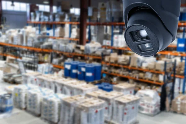 CCTV system security in warehouse of factory chemical blur background.