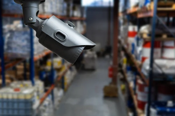 CCTV system security in warehouse of factory chemical blur background